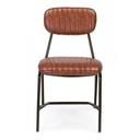 Sedia vintage in ecopelle arancio scuro con borchie metalliche